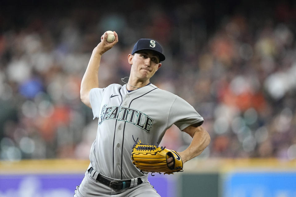 Seattle Mariners starting pitcher George Kirby throws against the Houston Astros during the first inning of a baseball game Sunday, July 31, 2022, in Houston. (AP Photo/David J. Phillip)