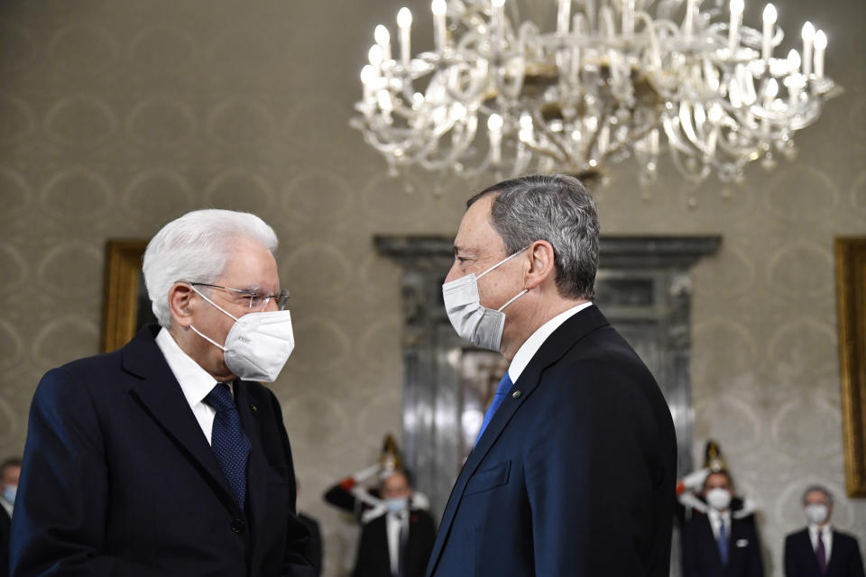 FILE - Italy's President Sergio Mattarella, left, greets Italy's Prime Minister Mario Draghi at the Quirinale presidential palace in Rome, Friday, Nov. 26, 2021, ahead of the French President visit. Italy has seen dozens of governments since the end of World War II, so it's very accustomed to political crises, but the tumult now roiling its political parties is playing out differently as Premier Mario Draghi's future as the nation's leader hangs in the balance. (Alberto Pizzoli/Pool photo via AP, File)