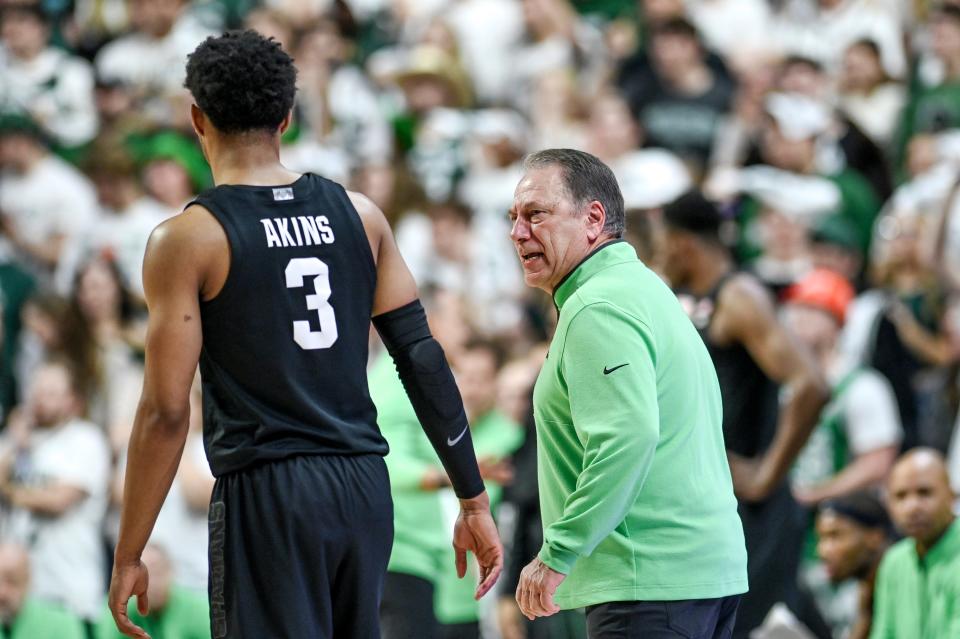 Michigan State's head coach Tom Izzo, right, talks with Jaden Akins after Akins' technical foul after a 3-pointer against Illinois during the first half on Saturday, Feb. 10, 2024, at the Breslin Center in East Lansing.