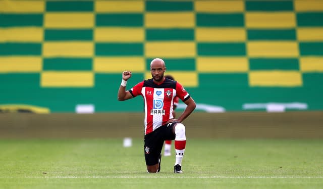 Southampton forward Nathan Redmond takes a knee in support the Black Lives Matter movement before a 3-0 win against former club Norwich at Carrow Road. The act has been performed by players from each Premier League club ahead of every game since football resumed