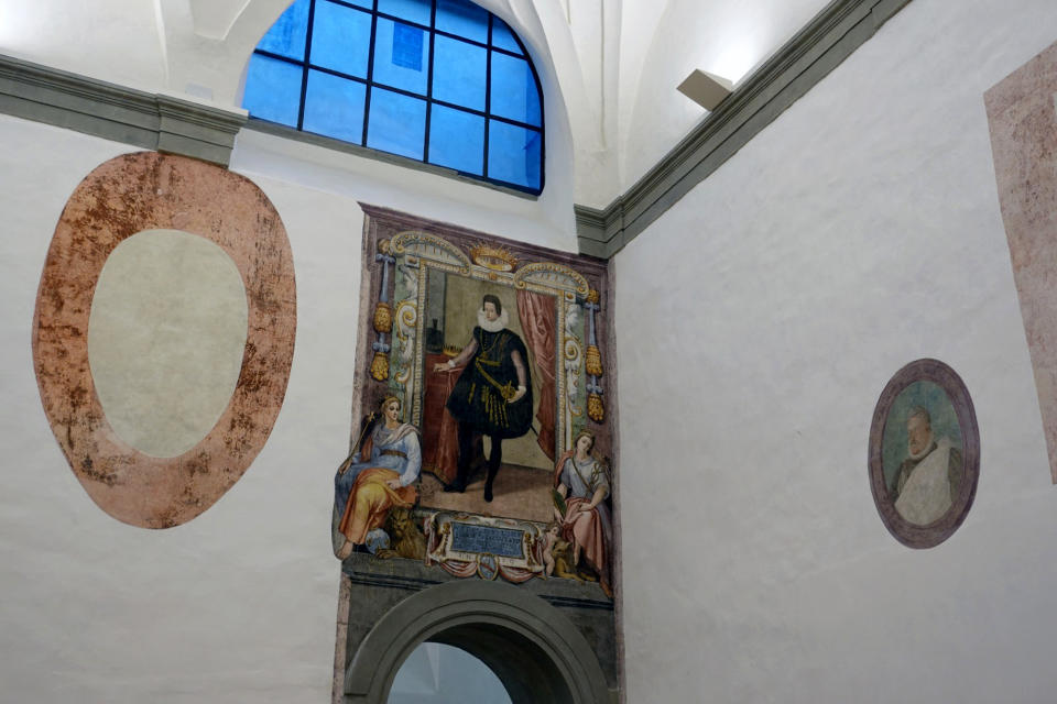 In this photo made available Thursday, April 22, 2021, a full-length and life-size fresco depicting the young Cosimo II de 'Medici, with the allegories of Florence and Siena, to be attributed to the painter Bernardino Poccetti (1548-1612) is seen on a wall after renovation works in the underground of the Uffizi Gallery, in Florence, Italy, Friday, April 16, 2021 . Recently discovered frescoes and new rooms filled with statuary will give visitors “a glorious introduction” Florence’s Uffizi Galleries when the museum reopens after months of COVID closure. Starting with the reopening, visitors will enter the museum from the west wing, facing the Arno River, where workers restoring galleries have discovered hidden beneath plaster and on ceilings frescoes dating from the 17th and 18th centuries. (Uffizi Gallery via AP)