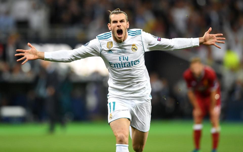 Gareth Bale of Real Madrid celebrates scoring his side's second goal during the UEFA Champions League Final against Liverpool  - Getty Images Europe