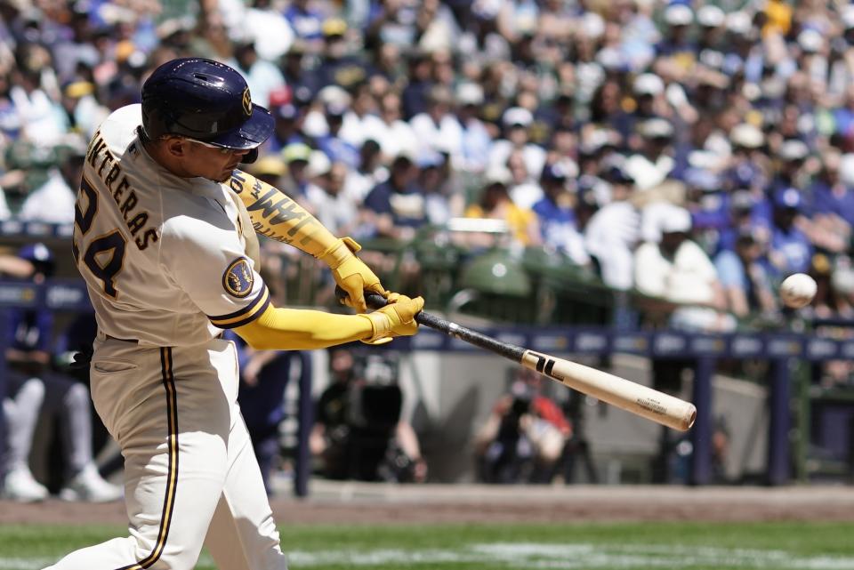 Milwaukee Brewers' William Contreras hits a home run during the fourth inning of a baseball game against the Los Angeles Dodgers Wednesday, May 10, 2023, in Milwaukee. (AP Photo/Morry Gash)