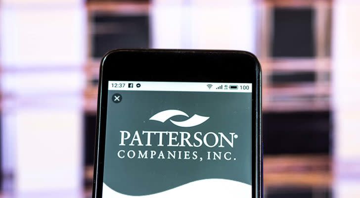 An image of a phone displaying the Patterson Companies, Inc. (PDCO) logo