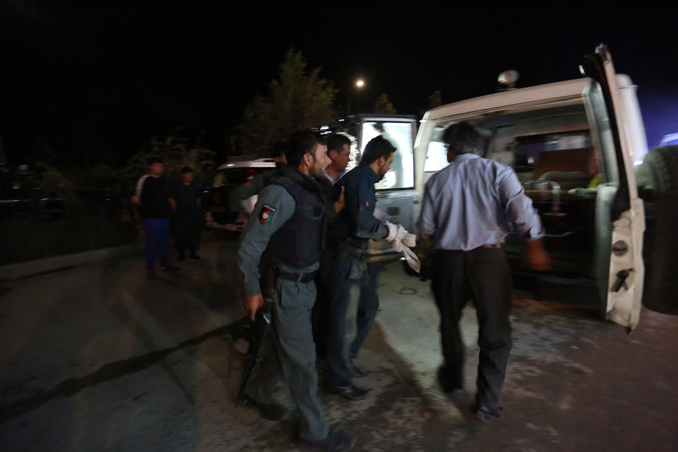 <p>Afghan policemen wounded in a complex Taliban attack on the campus of the American University in the Afghan capital Kabul on Wednesday, Aug. 24, 2016. (AP Photo/Rahmat Gul) </p>