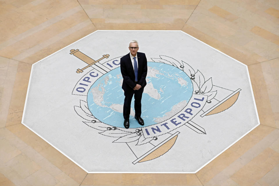 Interpol Secretary General Juergen Stock poses a the international police agency in Lyon, central France, Thursday, Nov.8, 2018. Stock says that the international police organization's rules forbid him from probing the fate of the man who served as Interpol president until two months ago when he vanished on a trip to China, his homeland. (AP Photo/Laurent Cipriani)