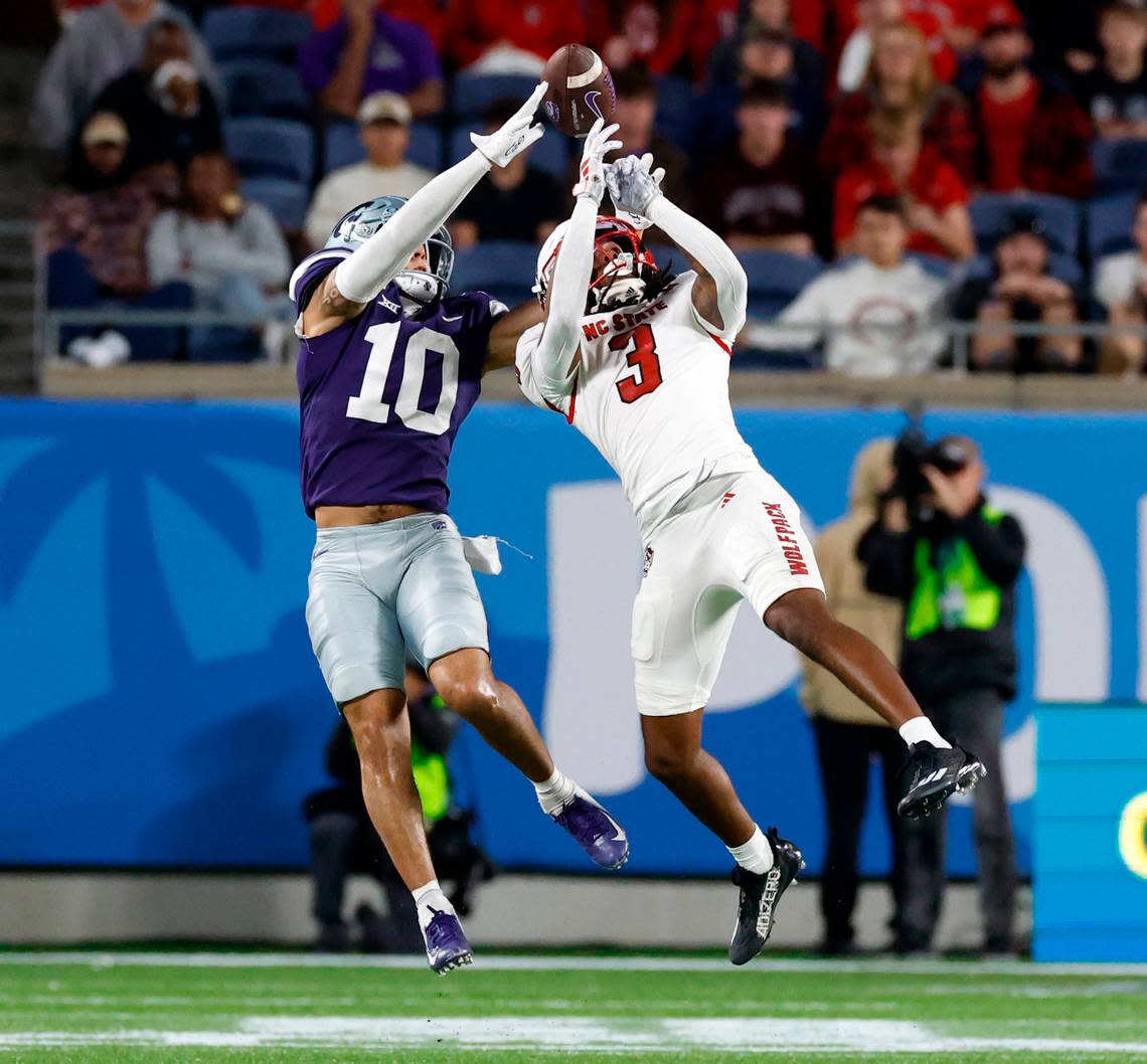 N.C. State cornerback Aydan White (3) breaks up a pass intended for Kansas State wide receiver Keagan Johnson (10) during the second half of Kansas State’s 28-19 victory over N.C. State in the Pop-Tarts Bowl at Camping World Stadium in Orlando, Fla., Thursday, Dec. 28, 2023.