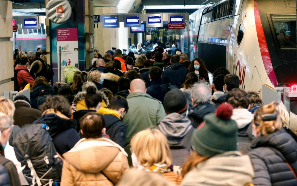 Parisians packed inter-city trains leaving the capital hours ahead of a new lockdown - AFP