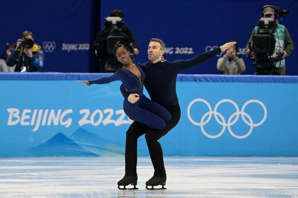 Canada's Vanessa James and Eric Radford compete in the pair skating free skating of the figure skating team event during the Beijing 2022 Winter Olympic Games at the Capital Indoor Stadium (AFP via Getty Images)