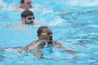 U.S. Olympic Water Polo Team attacker Max Irving trains for the Paris Olympics, at Mt. San Antonio College in Walnut, Calif., on Wednesday, Jan. 17, 2024. Irving's father, Michael Irving, is a Pac-12 college basketball referee. Max Irving is also the only Black man on the U.S. Olympic Water Polo Team and a prominent advocate for diversity in the sport. (AP Photo/Damian Dovarganes)