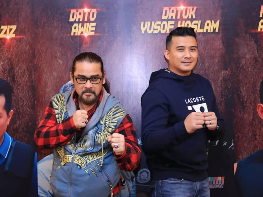 Datuk Awie and Aaron Aziz at the premiere of "Operasi X".