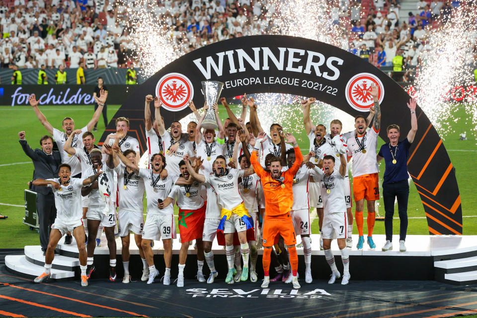 SEVILLE, SPAIN - MAY 18: Eintracht Frankfurt celebrate with the trophy after the UEFA Europa League final match between Eintracht Frankfurt and Rangers FC at Estadio Ramon Sanchez Pizjuan on May 18, 2022 in Seville, Spain. (Photo by Craig Mercer/MB Media/Getty Images)