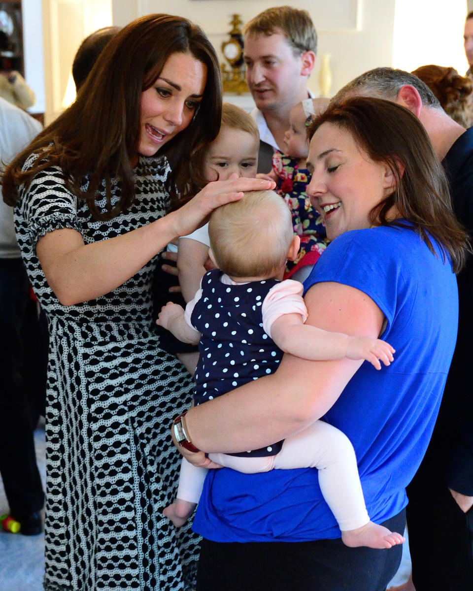 WELLINGTON, NZ - APRIL 09:  Catherine, Duchess of Cambridge and Prince George of Cambridge attend Plunkett's Parent's Group at Government House on April 9, 2014 in Wellington, New Zealand. The Duke and Duchess of Cambridge are on a three-week tour of Australia and New Zealand, the first official trip overseas with their son, Prince George of Cambridge.  (Photo by James Whatling-Pool/Getty Images)