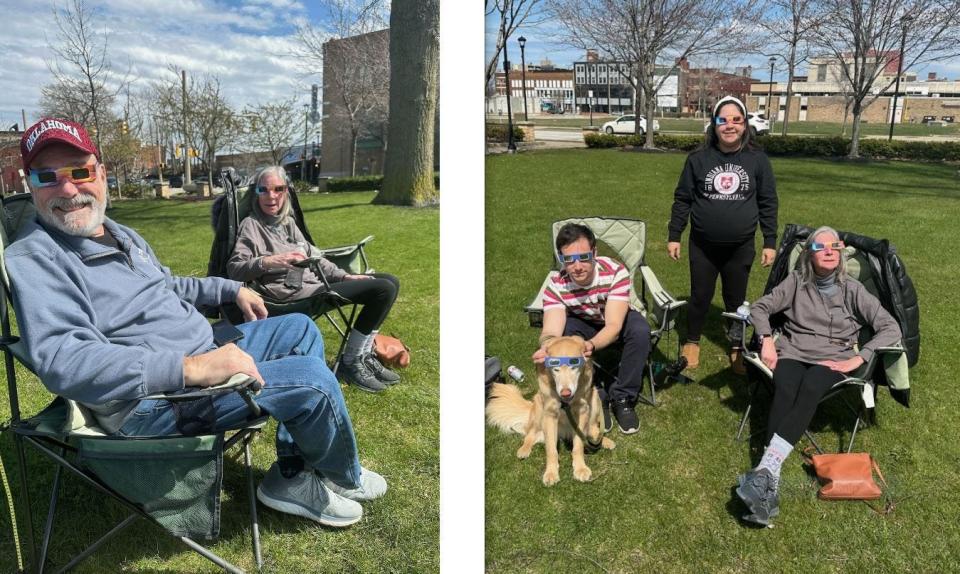 Jack and Maureen Slipe, of Bushkill, sport solar filter glasses at the April 8, 2024, total solar eclipse in Erie. The Slipes saw their first total solar eclipse in 2017 from Memphis, Tennessee. At right are the Slipes' son Eric, his wife Lizzy, and Maureen Slipe. In the front is Jax, Eric and Lizzy's dog.