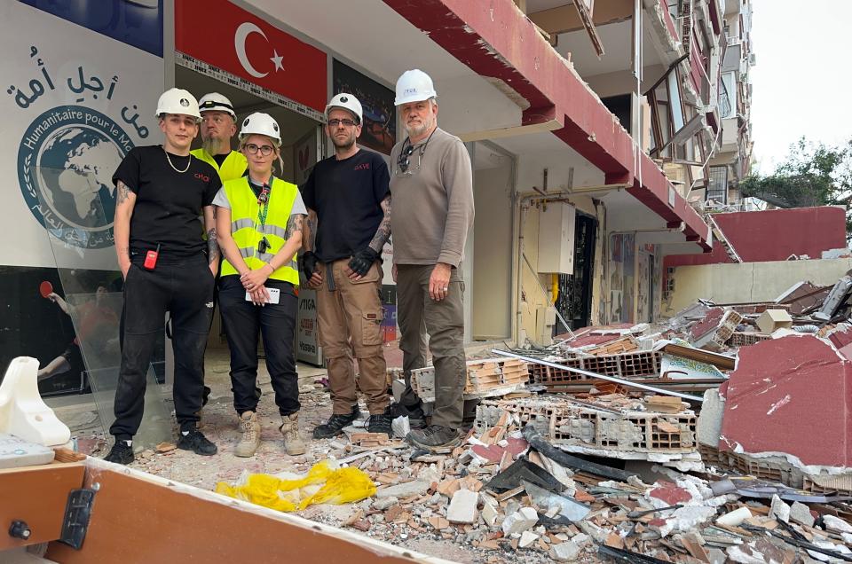 In the Turkish city of Antakya, Jacksonville-based Mike Merrill, right, poses with other members of his international animal rescue team: from left, Chloe Kennedy of Dogs Life Rescue in Britain, Tomas Rombalski (at rear) and Agnieszka Kowalczyk of Million Hearts Foundation in Poland and Dave Rogers of Dogs Life Rescue.