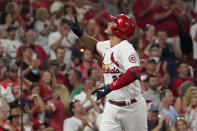 St. Louis Cardinals' Nolan Arenado celebrates after hitting a solo home run during the seventh inning of a baseball game against the Milwaukee Brewers Tuesday, Sept. 28, 2021, in St. Louis. (AP Photo/Jeff Roberson)