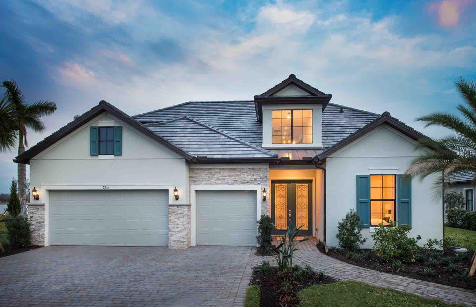 Pulte Homes’ Stonewater model includes nearly 3,900 square feet of living space. It overlooks a lake with a custom pool and spa. It has four bedrooms, four full-baths, a pool bath, a den, a dining room and a three-car garage.