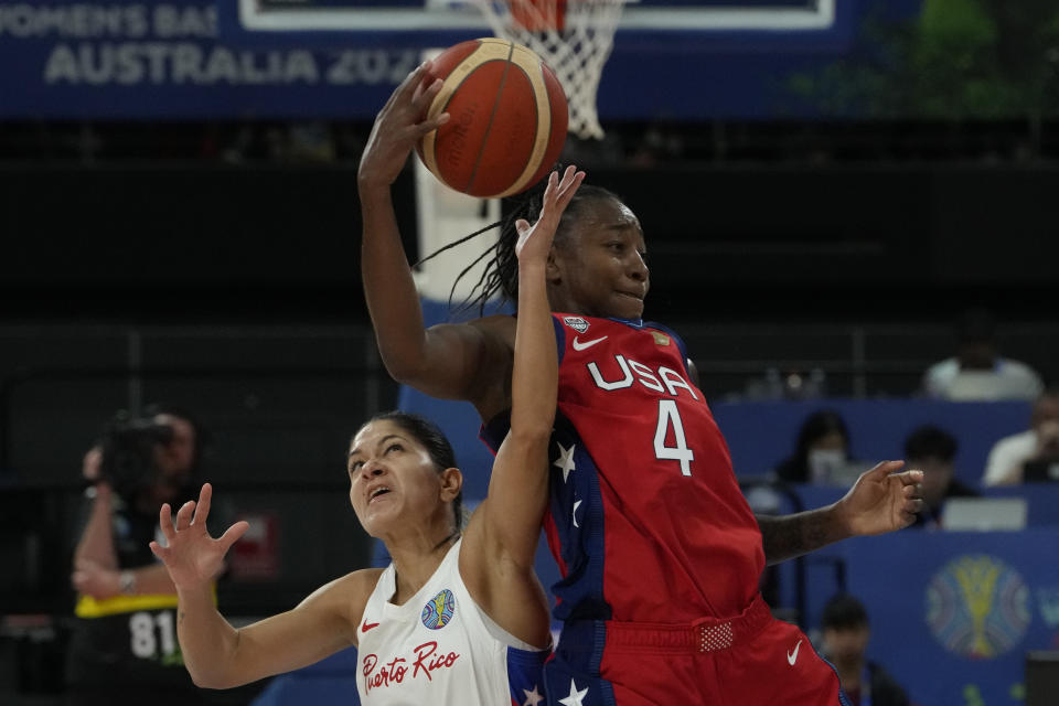 United States' Jewell Loyd keeps the ball from Puerto Rico's Pamela Rosado at the women's Basketball World Cup in Sydney, Australia, Friday, Sept. 23, 2022. (AP Photo/Mark Baker)