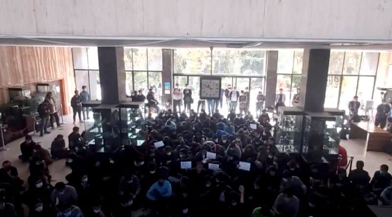 FILE PHOTO: Protesters chant at vigil for Amini in Tehran