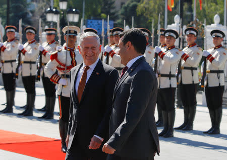 Macedonian Prime Minister Zoran Zaev and U.S. Secretary of Defense James Mattis attend a welcoming ceremony in Skopje, Macedonia September 17, 2018. REUTERS/Ognen Teofilovski