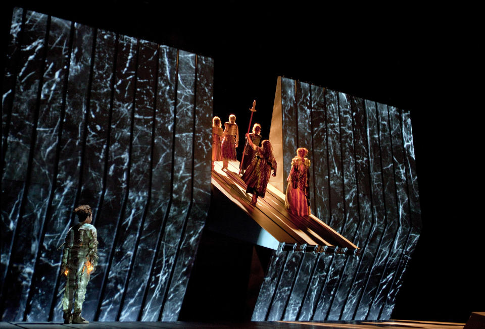 This March 30, 2012 photo provided by the Metropolitan Opera shows a scene from Wagner's, "Das Rheingold," during a dress rehearsal at the Metropolitan Opera in New York. On May 12 the Met concludes the last of three complete presentations of Robert Lepage's production of the four-opera Ring Cycle, which includes Das Rheingold; Die Walkure; Siegfried and Gotterdämmerung. (AP Photo/The Metropolitan Opera, Ken Howard)