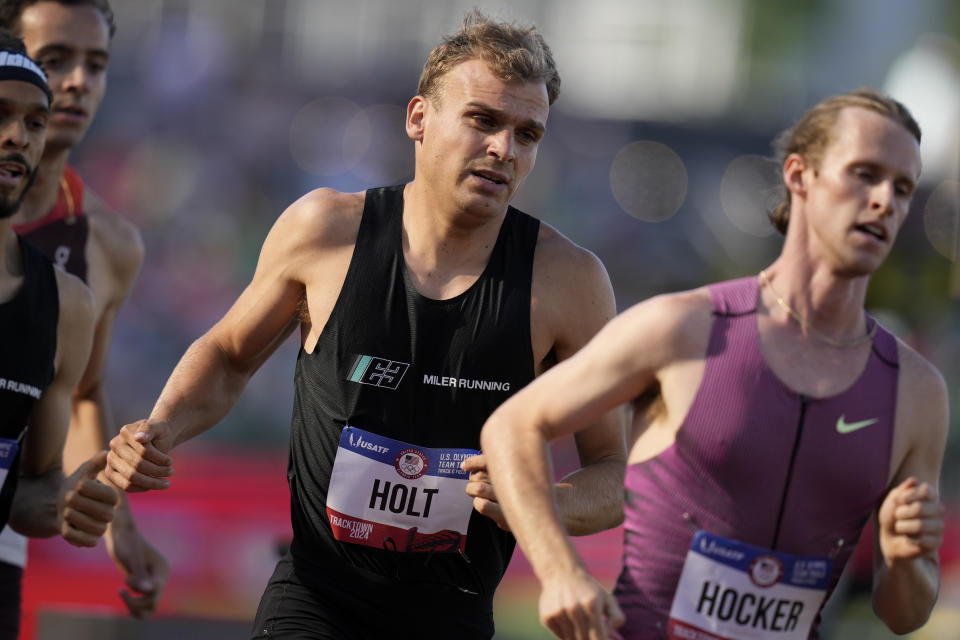 Eric Holt competes in a heat in the men's 1500-meter run during the U.S. Track and Field Olympic Team Trials Friday, June 21, 2024, in Eugene, Ore. (AP Photo/Charlie Neibergall)
