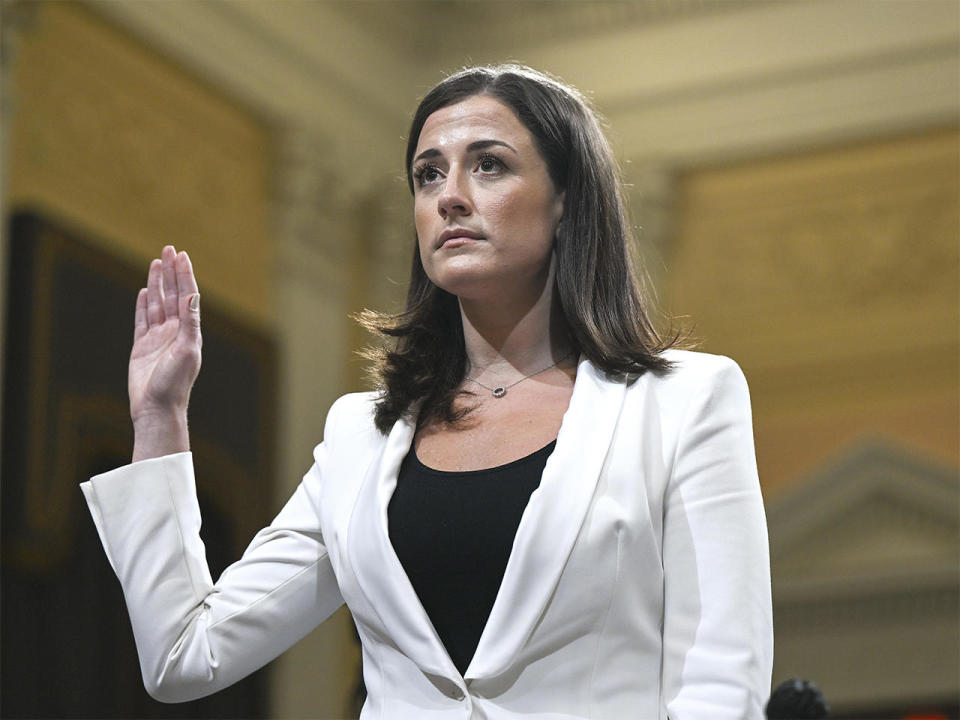 Cassidy Hutchinson, a former top aide to Trump White House chief of staff Mark Meadows, is sworn in as she testifies during the sixth hearing by the House Select Committee on the January 6th insurrection in the Cannon House Office Building on June 28, 2022 in Washington, D.C.  / Credit: BRANDON BELL/Getty Images