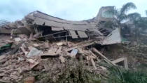 A general view shows debris of a collapsed building in Raigad in the western state of Maharashtra.