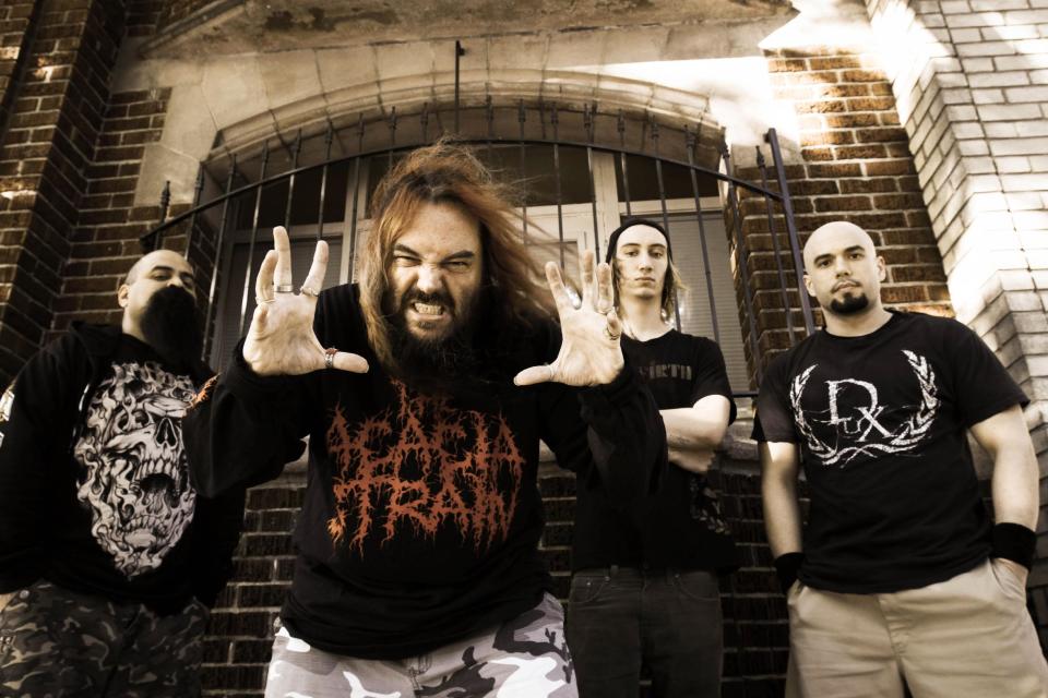 This undated photo provided by Oasis Management shows Soulfly band members, from left, Tony Campos, Max Cavalera, Zyon Cavalera and Marc Rizzo, in Seattle. Cavalera plays heavy music, growling his vocals over blistering riffs and thumping double-bass drums. Peel back those surface layers and the Soulfly founder is the antithesis of the metalhead stereotype: Family oriented, proudly spiritual, collaborative in a combative genre, world music experimenter. (AP Photo/Oasis Management, Charlene Tupper)