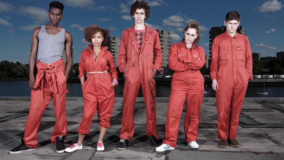 A promo image from the British TV series Misfits shows a group of teenagers wearing orange jumpsuits looking sassy