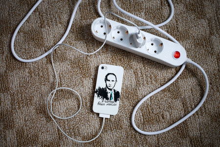 A mobile phone cover depicting Russian President Vladimir Putin and which reads "I read your mind" is seen in this photo illustration taken in a hotel room in Kazan, Russia, August 6, 2015. REUTERS/Stefan Wermuth