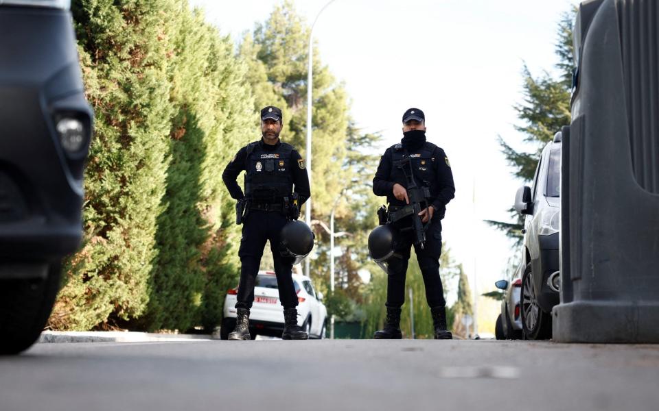 Police stands outside of Ukrainian embassy after, Spanish police said, blast at embassy building injured one employee while handling a letter, in Madrid, Spain November 30, 2022. REUTERS/Juan Medina - REUTERS/Juan Medina