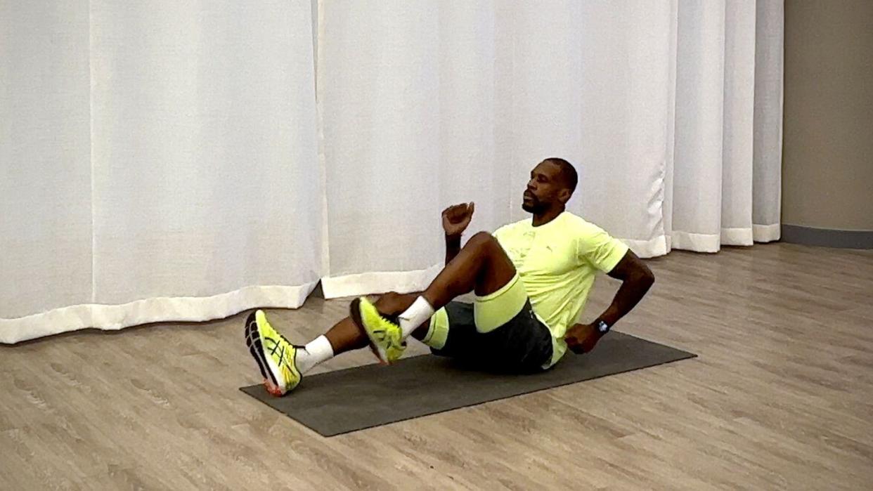 10minute core workout, yusuf jeffers practicing sprinter situp exercise