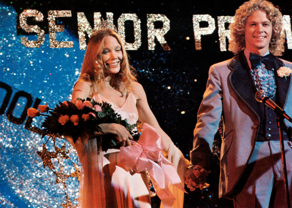 Spacek and her onscreen prom date, William Katt, before disaster strikes in <em>Carrie</em>. (Photo: Courtesy Everett Collection)