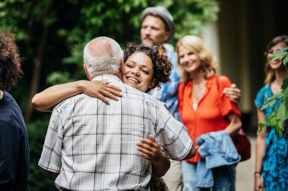 <span class="caption">These days, people in their 20s are figuring out who they are as adults, rather than experiencing "extended adolescence." </span> <span class="attribution"><a class="link " href="https://www.gettyimages.com/detail/photo/elderly-man-saying-goodby-to-family-after-bbq-royalty-free-image/1014771010?adppopup=true" rel="nofollow noopener" target="_blank" data-ylk="slk:Hinterhaus Productions/DigitalVision via Getty Images;elm:context_link;itc:0;sec:content-canvas"> Hinterhaus Productions/DigitalVision via Getty Images</a></span>