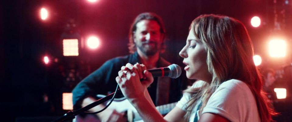 Lady Gaga and Bradley Cooper on stage