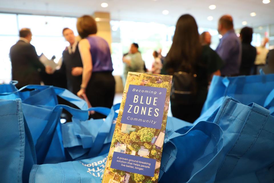 A pamphlet for Blue Zones sits at a table for guests at the kick-off event for its south Phoenix project on March 28. So far more than 500 community members have been surveyed before plans are drafted.