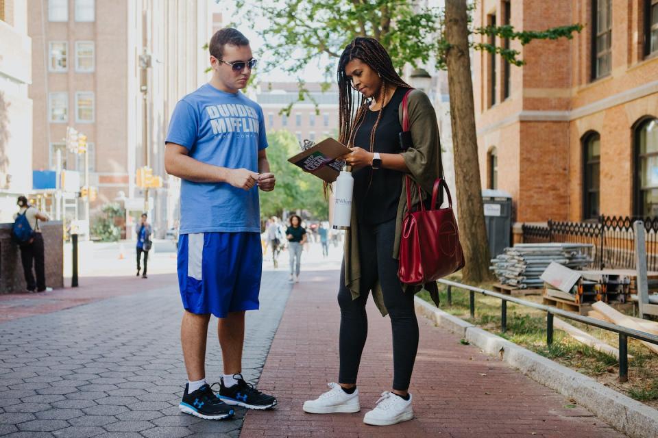 A University of Pennsylvania student helps register another to vote during a voter drive on campus on Aug. 31, 2022. <a href="https://media.gettyimages.com/photos/coby-rich-a-junior-at-the-university-of-pennsylvania-helps-chelsea-picture-id1242958937?s=612x612" rel="nofollow noopener" target="_blank" data-ylk="slk:Michelle Gustafson for The Washington Post via Getty Images;elm:context_link;itc:0;sec:content-canvas" class="link ">Michelle Gustafson for The Washington Post via Getty Images</a>