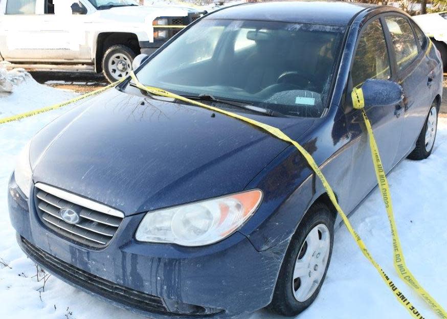Police believe this blue Hyundai Elantra is linked to a homicide that occurred at a vacant home on Liam Drive in Outer Cove on Tuesday morning. (Royal Newfoundland Constabulary - image credit)