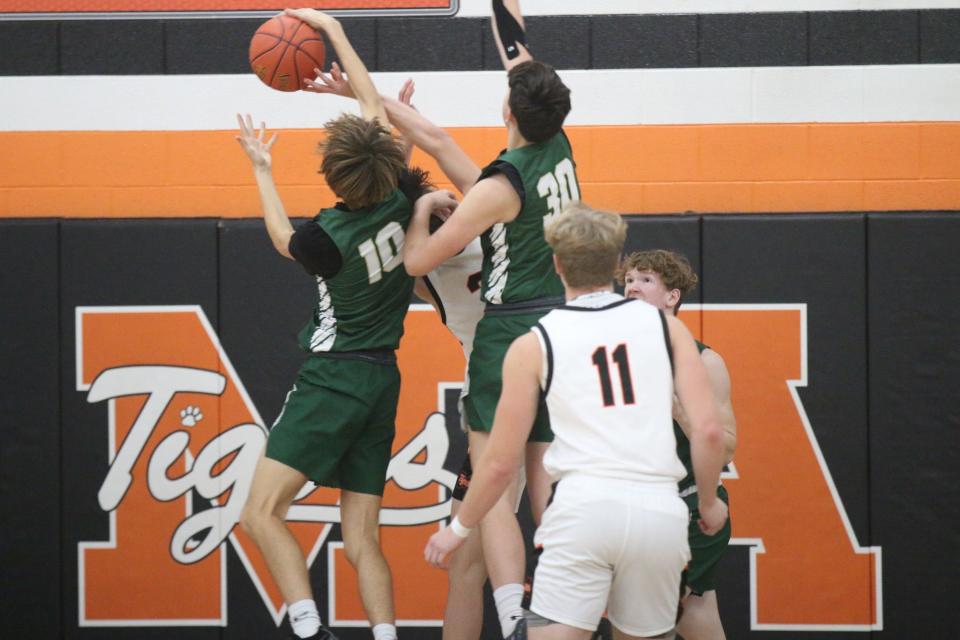 Dillon Limoges (10) blocks Madrid's shot from Toryn Severson on Friday, Dec. 8, 2023.