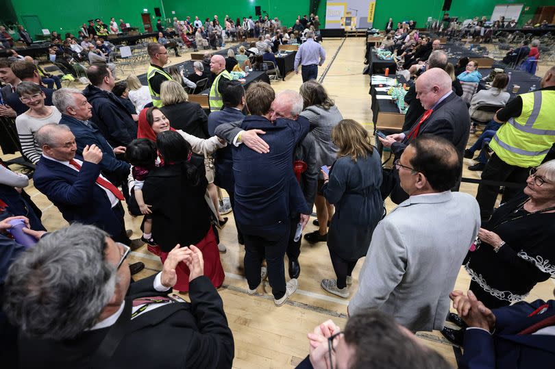 Labour's John Southworth celebrates his shock victory in North Manor ward -Credit:Manchester Evening News