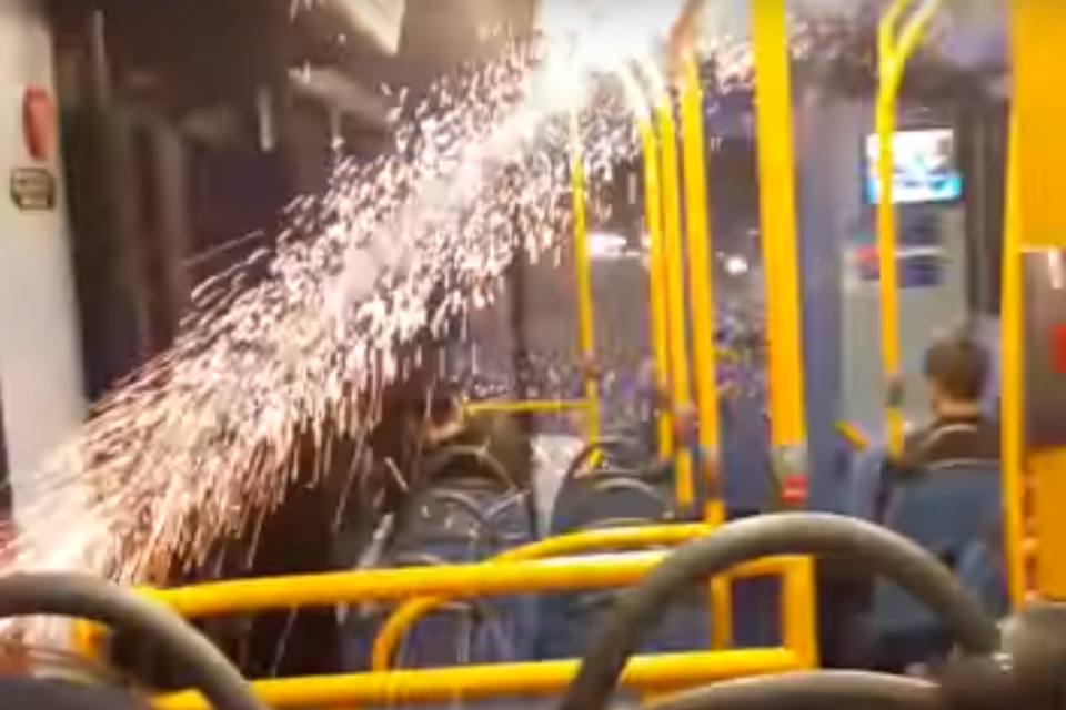 Witnesses filmed the firework being launched onto the bus (Apostolos)