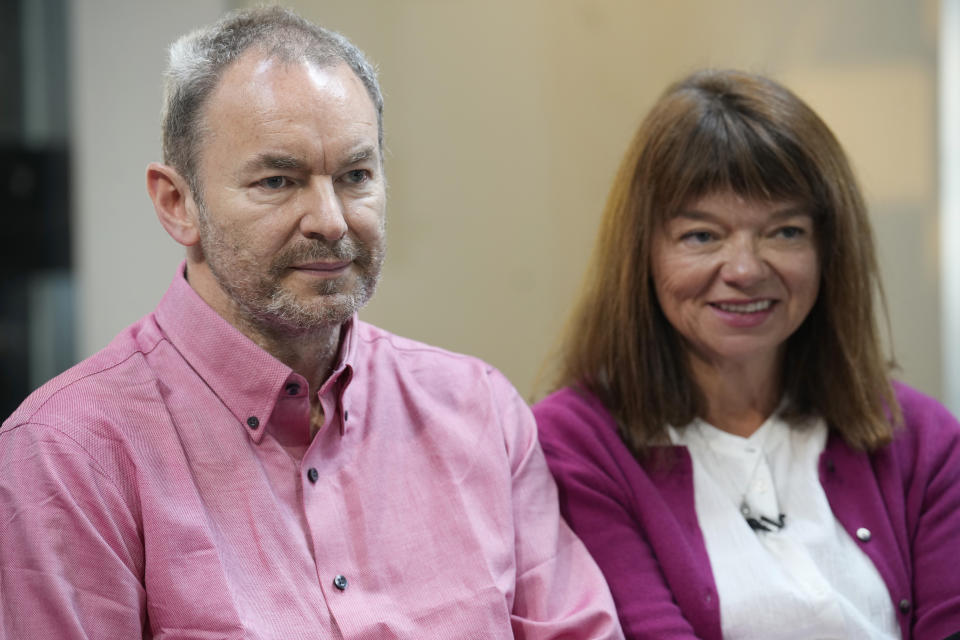 Simon Glass, left, and his wife, Sally Glass, talk about the $19-million settlement from state and local law enforcement agencies for the killing of the couple's 22-year-old son, Christian, in June 2022, while he suffered a mental health crisis on Tuesday, May 23, 2023, during a news interview in the offices of the couple's lawyers in Denver. As part of the settlement, training for law officers will change as well. (AP Photo/David Zalubowski)