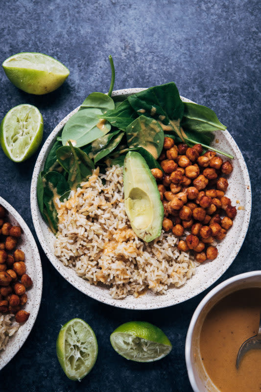 <p>Well and Full</p><p>This vegan rice bowl is made with mouthwatering barbecue chickpeas and paired with long-grain brown rice and a hummus vinaigrette.</p><p><strong>Get the recipe: <a href="https://wellandfull.com/2016/05/barbecue-chickpea-rice-bowl-w-hummus-vinaigrette/" rel="nofollow noopener" target="_blank" data-ylk="slk:Vegan BBQ Chickpea Rice Bowl with Hummus Vinaigrette;elm:context_link;itc:0;sec:content-canvas" class="link rapid-noclick-resp">Vegan BBQ Chickpea Rice Bowl with Hummus Vinaigrette</a></strong></p>