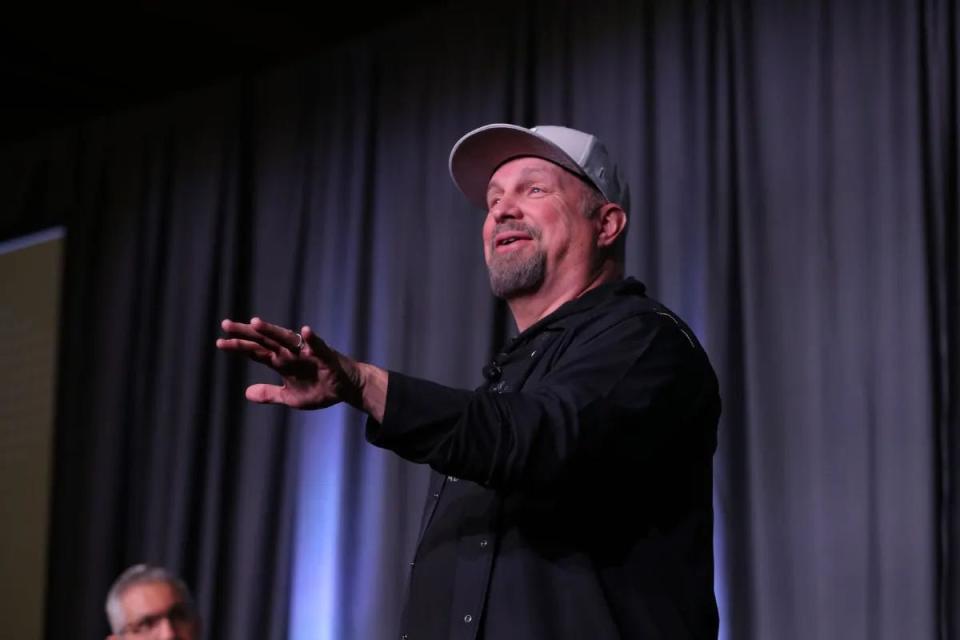 Garth Brooks speaks at Monday's Country Radio Seminar. "Radio is the window to the people," he told employees and executives at the conference.