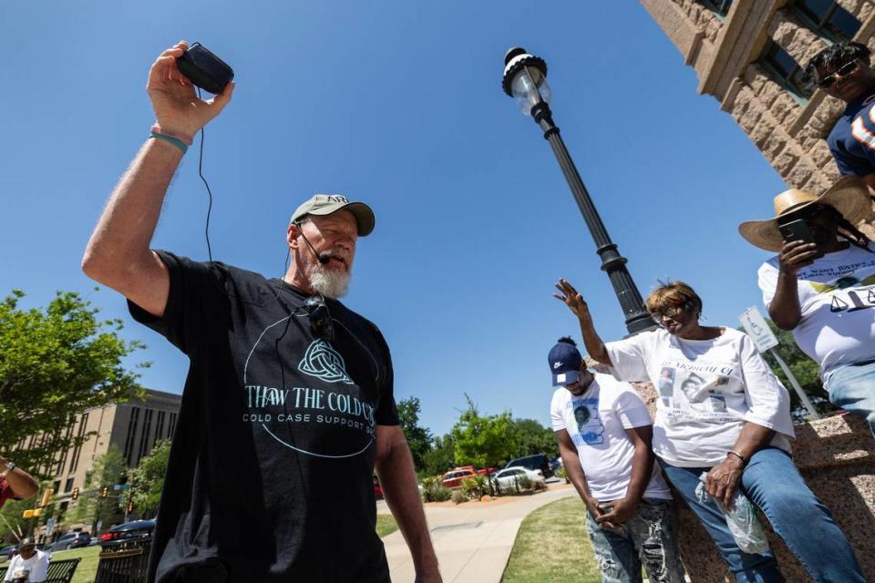 Jim Miller, who is in attendance for the death of his sister Carla Walker, says a prayer to the families gathered during the cold case rally in front of the Tarrant County Courthouse in downtown Fort Worth on Saturday, April 13, 2024. The Fort Worth Police Department has around 1,000 cold cases unsolved. The rally calls for the city to bring more resources to the departments cold case unit to help solve cases.