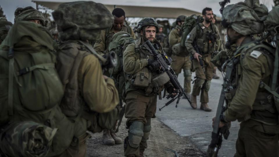 Israeli soldiers regain control of the Kibbutz Be'eri, Oct. 11, Kibbutz Be'eri. (Ilia Yefimovich/The Associated Press)