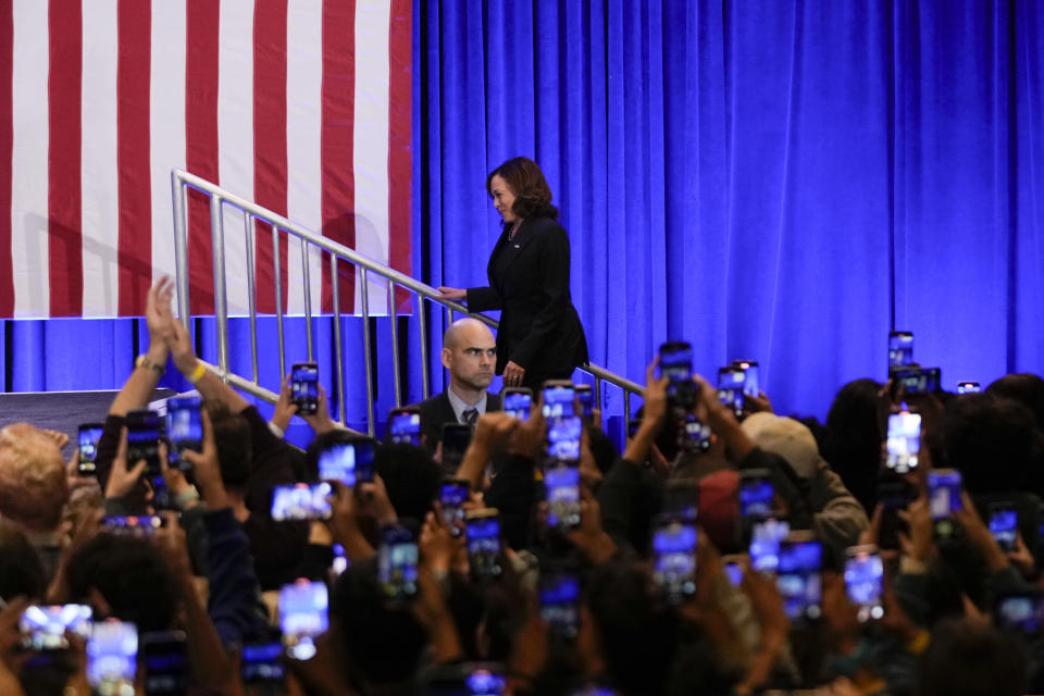 Vice President Kamala Harris walks up the steps toward the podium to speak at a campaign rally in Los Angeles, Monday, Nov. 7, 2022. (AP Photo/Jae C. Hong)