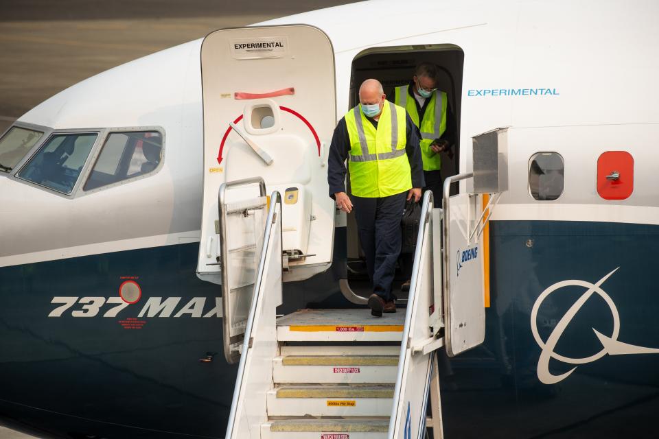 FAA chief Steve Dickson walks out of a Boeing 737 MAX, after concluding a test flight and landing at Boeing Field in Seattle, Wednesday, Sept. 30, 2020. The Max has been grounded since March 2019, after the second crash. (Mike Siegel/The Seattle Times via AP, Pool)