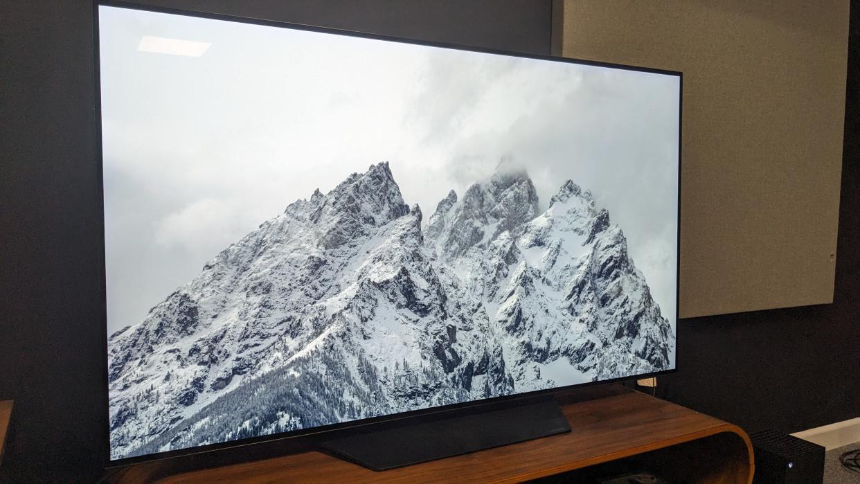 LG B3 OLED with white, snowy mountains displayed on screen . 